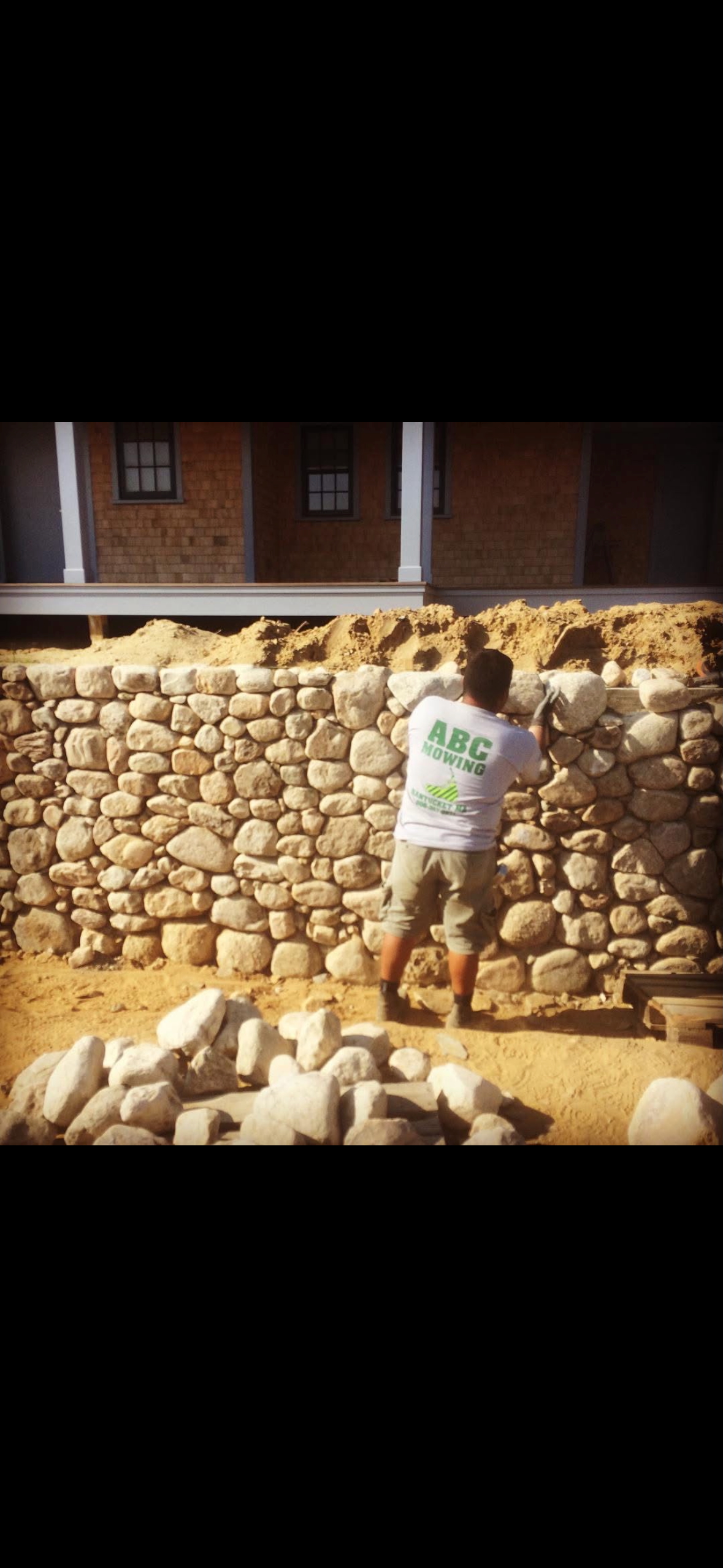 ABC crew building stone wall on Nantucket