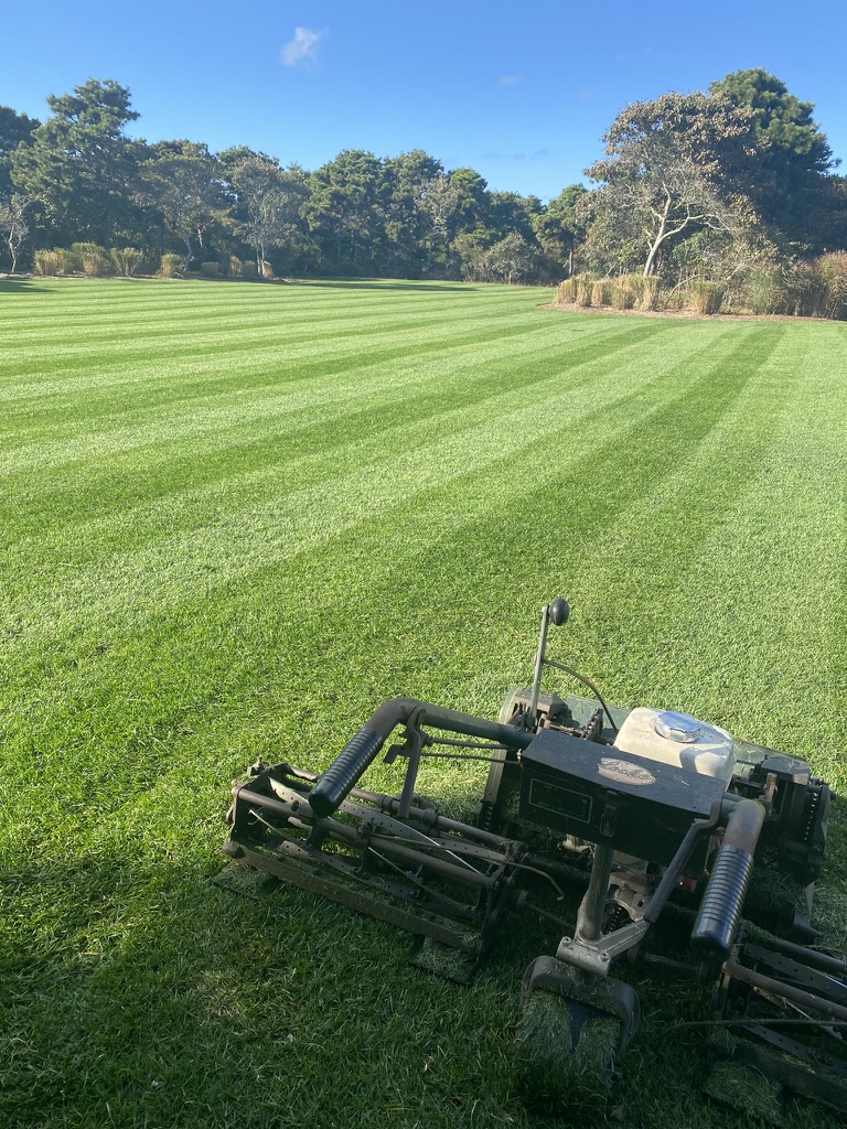 Lawn mower with striped lawn on Nantucket